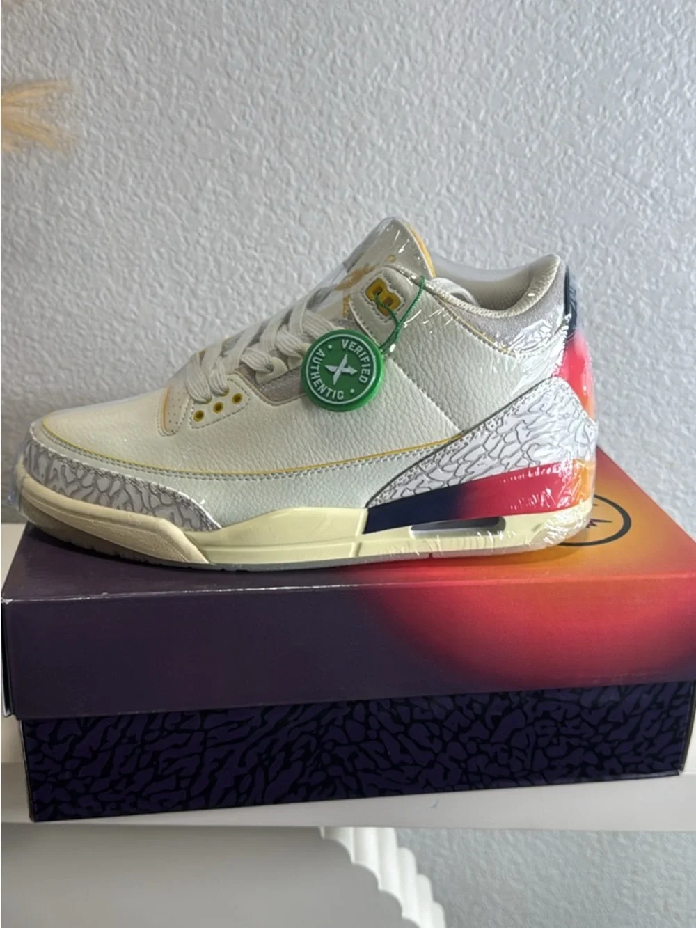 Jordan Men's White Sneakers with Multicolor Heel Accent